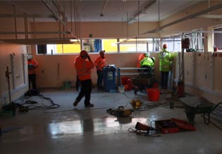 engineers assessing ground improvement site